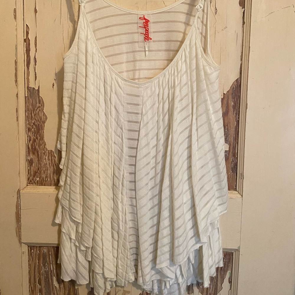 Free People Top. Smoke free home. Gently worn. No defects.